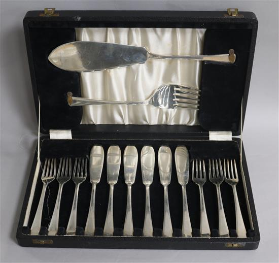 A cased set of six pairs of silver fish eaters and pair of matching servers, Elkington & Co, Birmingham, 1946/50, 29.5 oz.